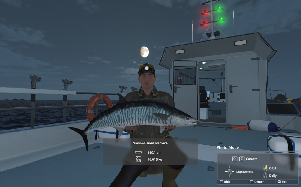 Trophy Narrow-Barred Mackerel held on the boat deck at night at Kaiji No Ri in Fishing Planet, 140.1 cm and 16.618 kg
