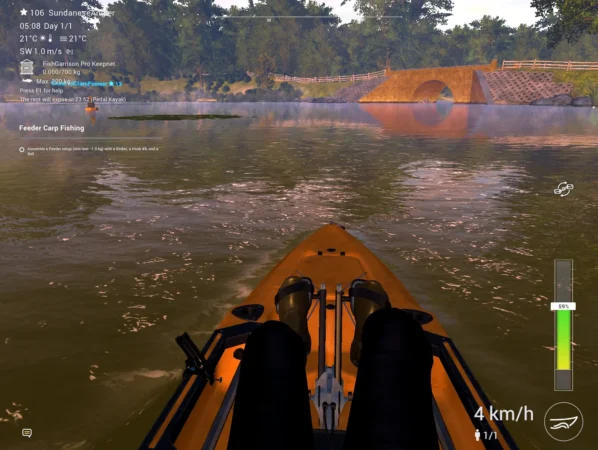 First person view pedalling a trolling kayak across Lone Star Lake toward the stone bridge